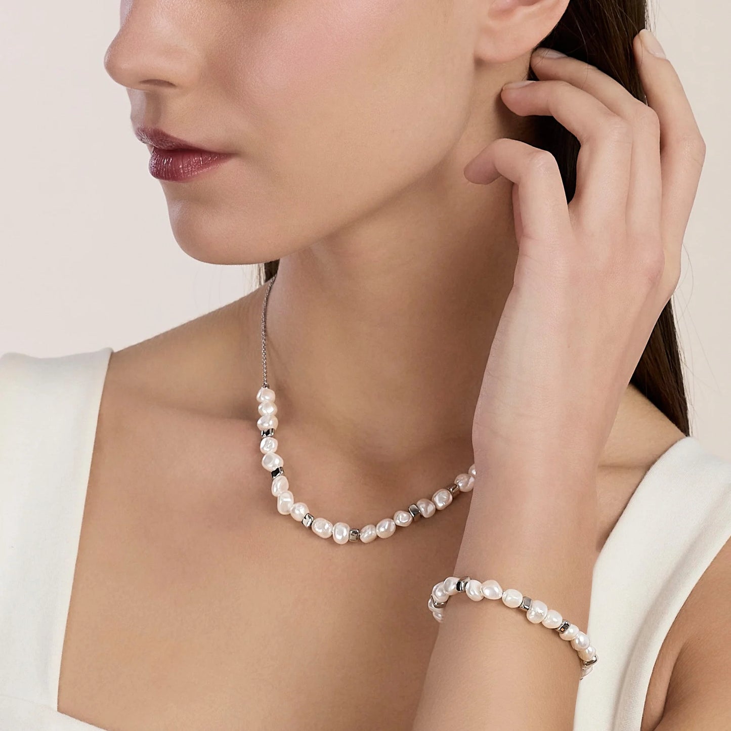 KIDULT - Bracciale in acciaio e perle conchiglia