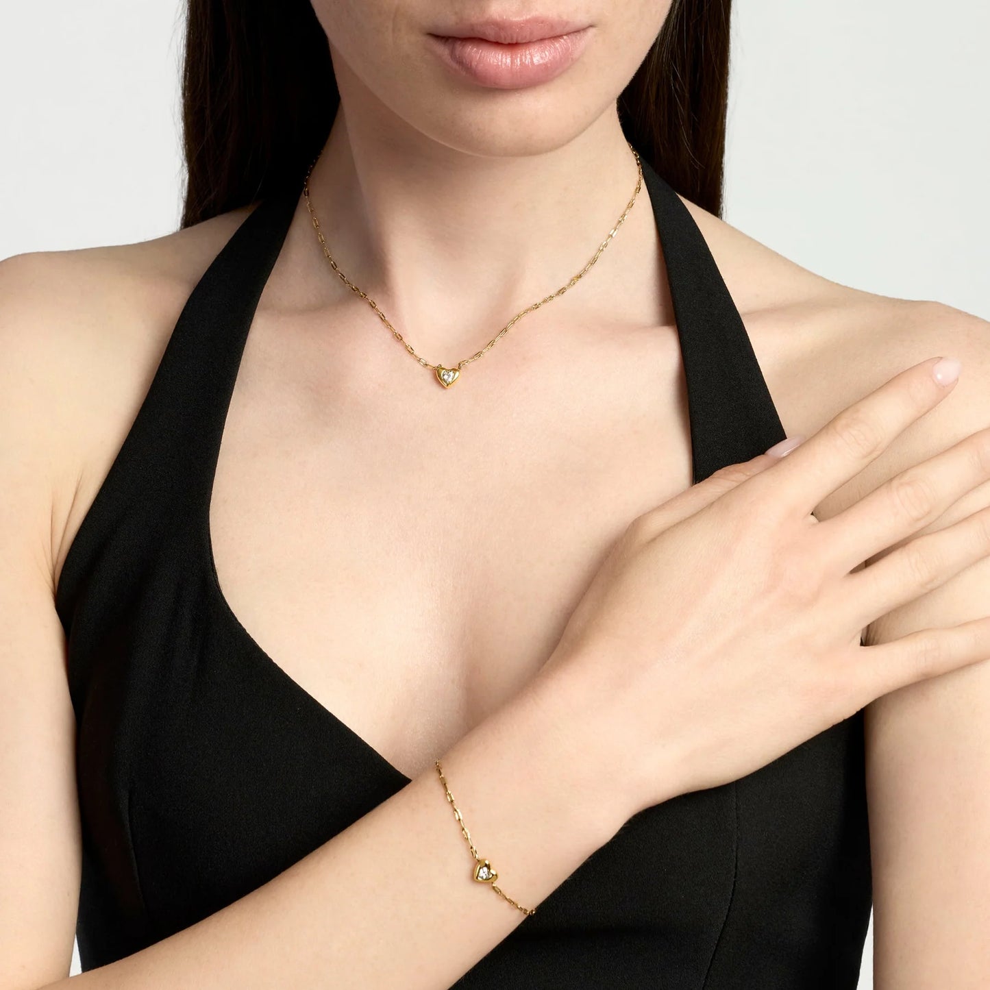 KIDULT - Bracciale in acciaio dorato con catena martellata e cuore con cristallo